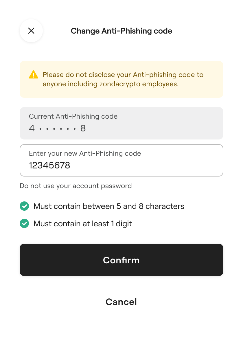  A screenshot from the zondacrypto app for changing the Anti-Phishing code. The screen shows a warning not to share the code, fields for the current and new codes, and the requirements for the code. It has "Confirm" and "Cancel" buttons at the bottom.