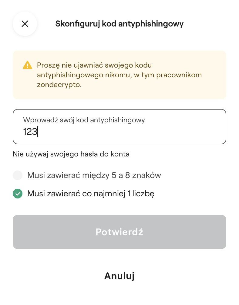 Zrzut ekranu z aplikacji zondacrypto. W oknie konfiguracji kodu antyphishingowego widoczne jest ostrzeżenie, pole do wpisania nowego kodu oraz jego wymagania. Na dole znajdują się przyciski "Potwierdź" i "Anuluj".